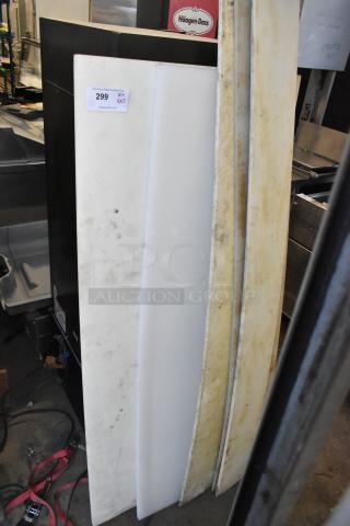 Five various cutting boards in mixed condition, featuring wear marks. Auction label indicates quantity of five, amplifying bid value.