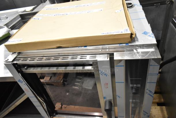 Brand new Moffat E35D6-26-P263 convection oven with steam injection, stainless steel, broken glass door, 208V, 3 phase.