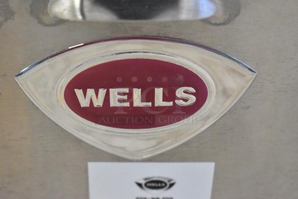 BRAND NEW Wells 5G-G19-208 stainless steel 36" electric countertop griddle. Slight scratches. Model G19, 208V.