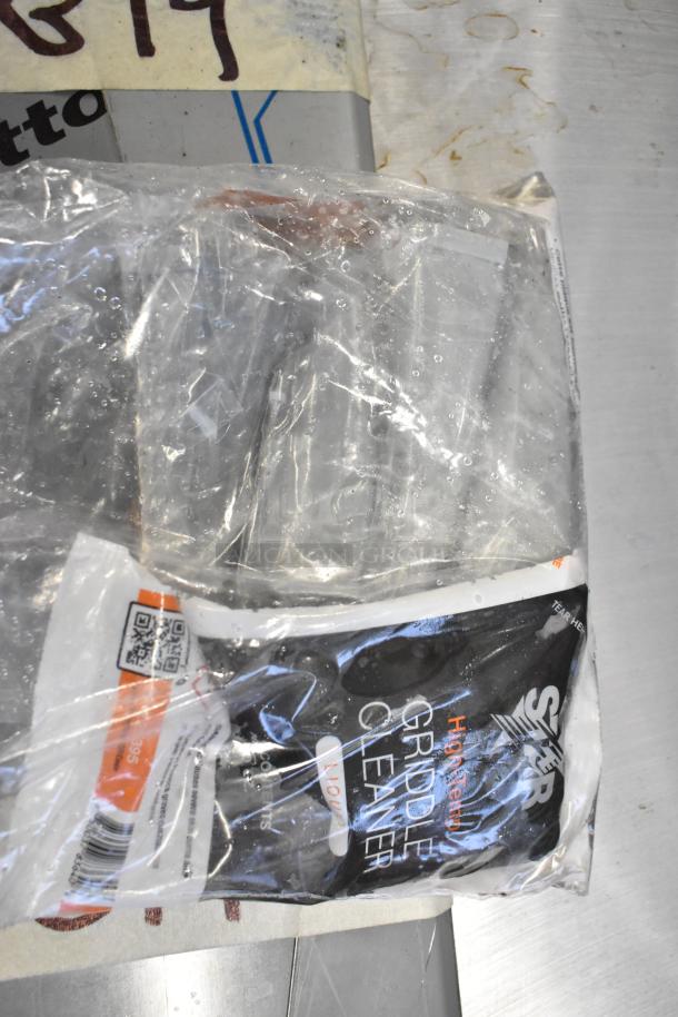 BRAND NEW SCRATCH AND DENT! Wells 5G-G19-208 Stainless Steel Countertop Flat Top Griddle, 208V, with packaging.