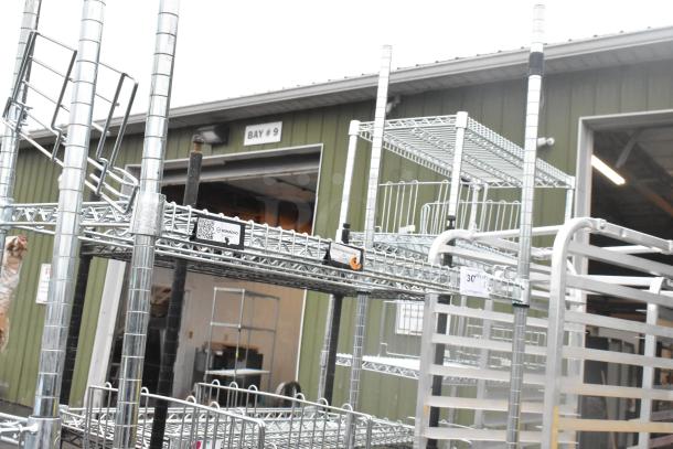 Chrome finish 4-tier wire shelving unit in good condition, includes labels and QR code, buyer dismantle for shipping.