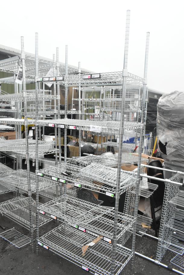 Chrome finish 5 tier wire shelving unit. Sturdy metal construction, visible labels. Buyer must dismantle. Consider freight.