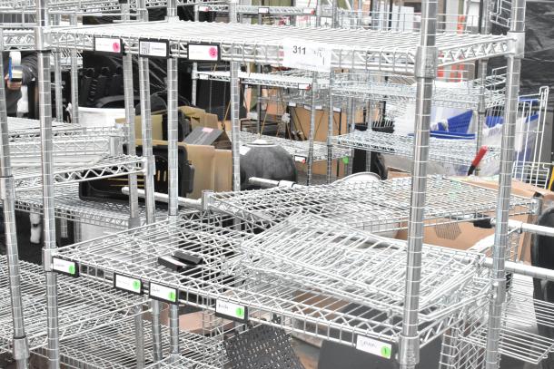 Chrome finish 5 tier wire shelving unit, sturdy and spacious. Buyer must dismantle. Consider freight charges for shipping.