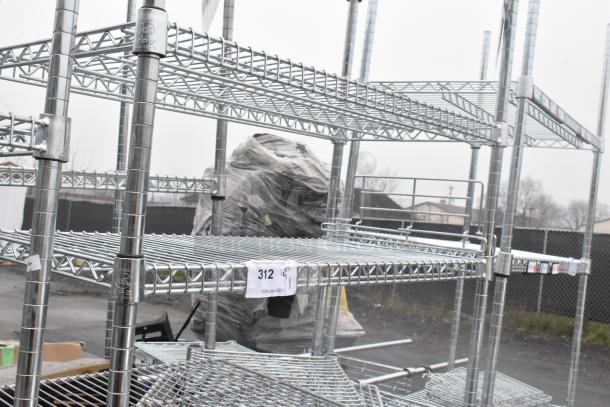 Chrome finish 6-tier wire shelving unit, industrial style, excellent condition, buyer dismantles, freight charges apply.