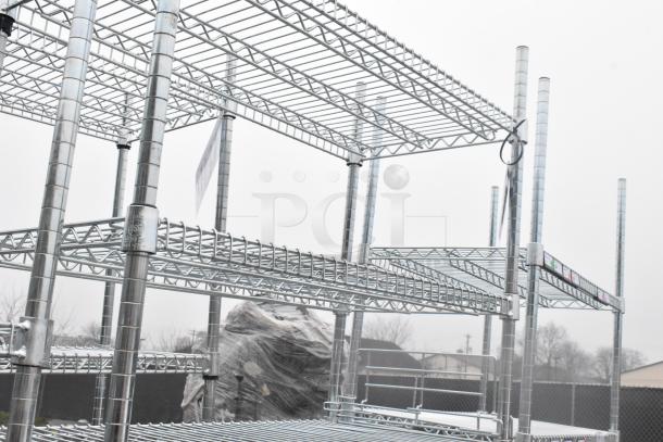 Chrome finish 6 tier wire shelving unit, industrial-grade, in excellent condition. Buyer to dismantle; freight charges apply.