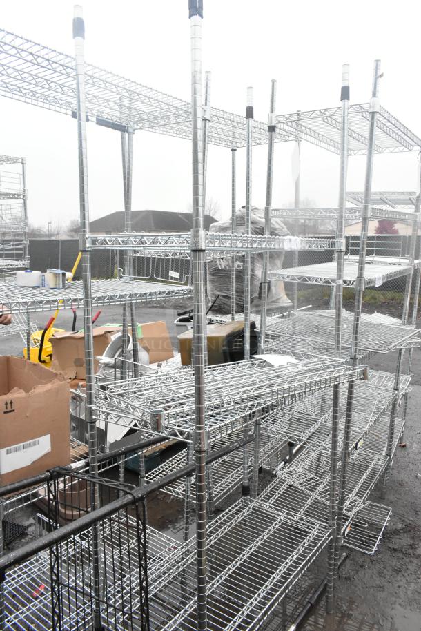 Chrome finish 4-tier wire shelving unit, needs dismantling, good condition, ideal for storage, freight charges apply.