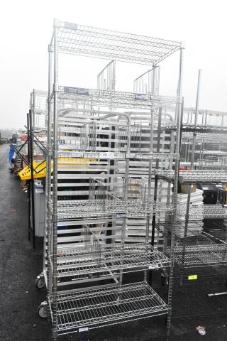 Chrome finish 6-tier wire shelving unit on wheels, excellent condition. Buyer must dismantle; consider freight charges.