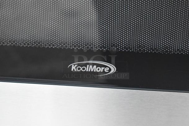 KoolMore KM-MOT-1SS stainless steel microwave oven, 120V, new with minor scratches. Visible KoolMore logo.