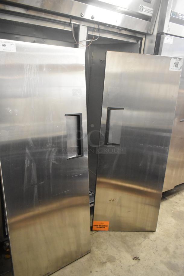 2024 True TG2R-2S-HC stainless steel 2-door cooler; needs door reattachment; includes poly-coated racks; 115V, 1 phase.