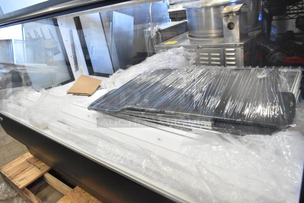 Federal Metal Floor Style Merchandiser Display Case, sleek design, excellent condition, wrapped trays, glass panels, ideal for retail.