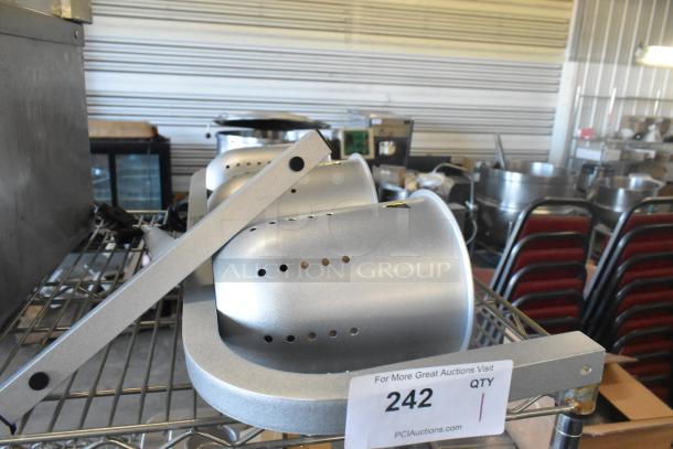 Brand new Avantco 177W63 heat lamp, free-standing with three bulbs and T-legs, slight scratches, on metal shelf.