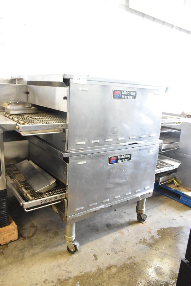 Middleby Marshall PS638G stainless steel commercial conveyor pizza ovens, natural gas, 89,000 BTU, on casters, 2021 model.