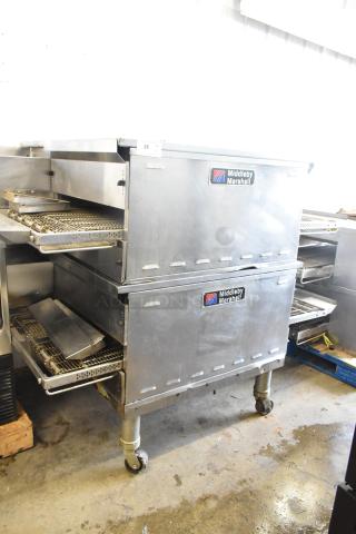 2 2021 Middleby Marshall PS638G Stainless Steel Commercial Natural Gas Powered Conveyor Pizza Ovens on Commercial Casters. 89,000 BTU. 2 Times Your Bid! - Item #1222287