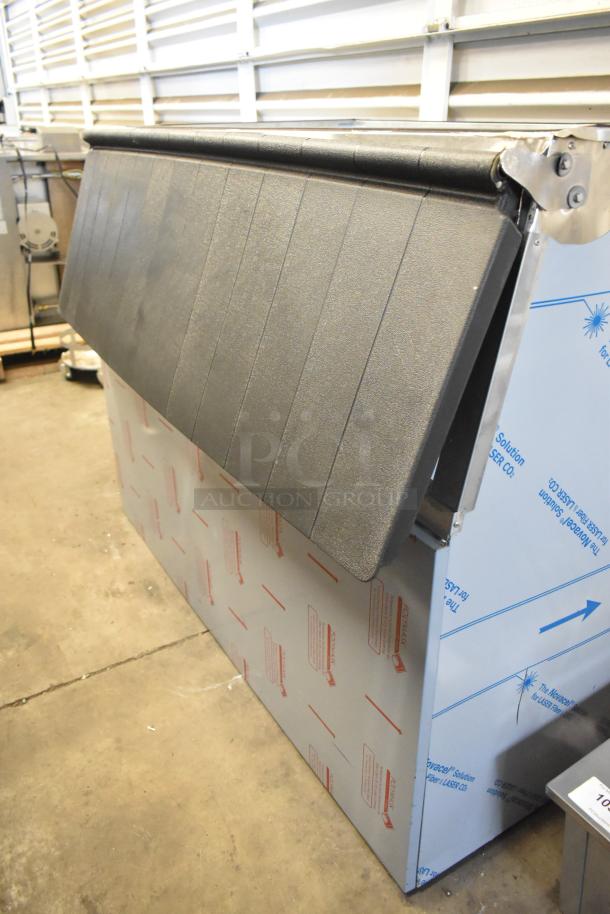 BRAND NEW Hoshizaki B-900SF 52" stainless steel ice storage bin, 900 lb capacity, shown with protective wrap.