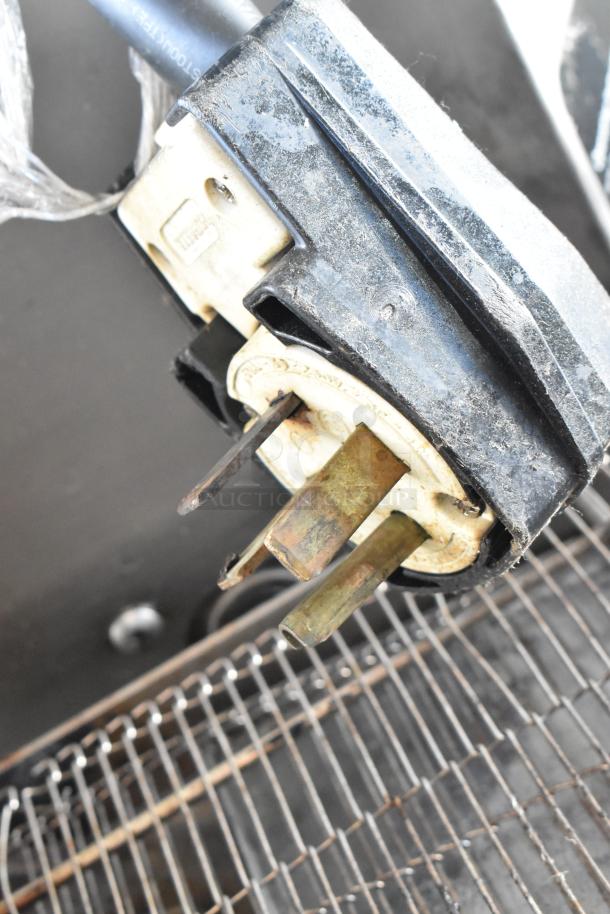 Close-up of electrical plug for Turbochef HhC2020 commercial electric conveyor oven, shows 208/240 volts, 3 phase.