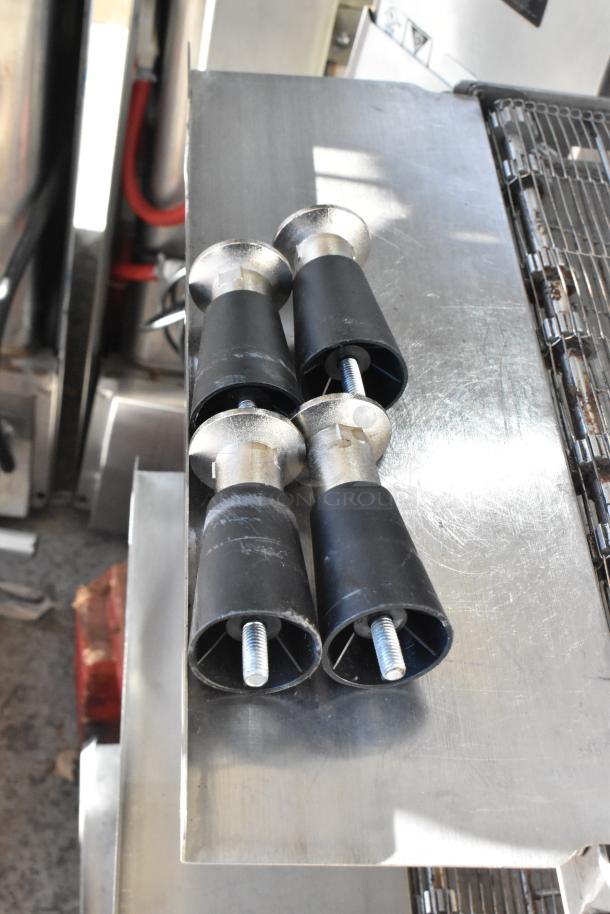 Turbochef HhC2020 stainless steel conveyor oven legs on stainless surface, new condition.