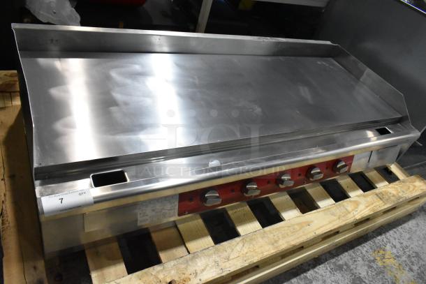 Brand new Avantco 177EG60E 60" stainless steel electric griddle with thermostatic controls, 240V, 3-phase, scratch and dent.