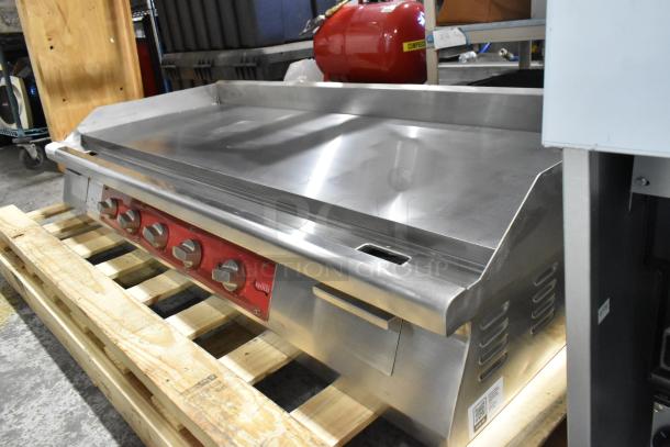 Brand new Avantco 177EG60E stainless steel 60" electric griddle with thermostatic controls. Scratch and dent condition.