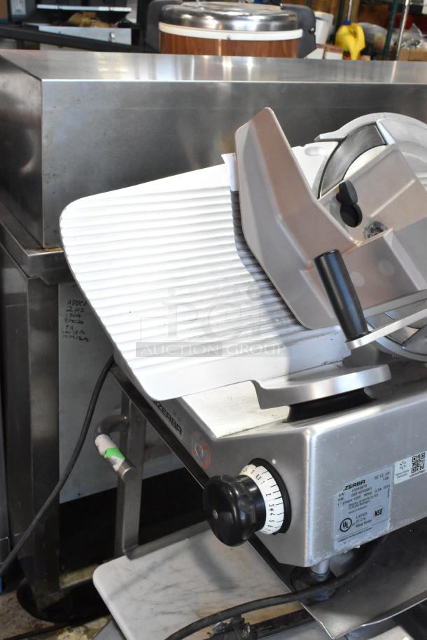 Bizerba SE 12 US metal commercial countertop meat slicer with blade sharpener and stainless steel stand. 120V, 1 Phase.