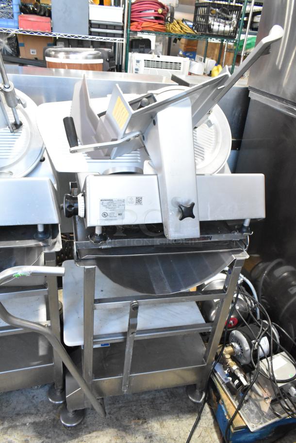 Bizerba SE 12 US metal commercial meat slicer with blade sharpener on stainless steel stand. 120V, 1 phase. Clean condition.