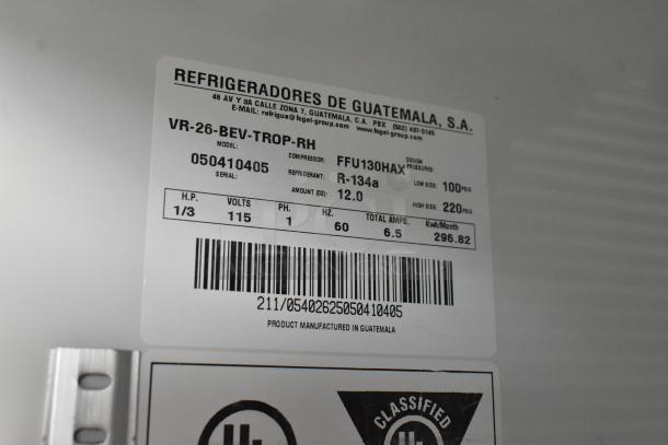 Fogel VR-26-BEV-TROP-RH commercial cooler label indicates model, 115 volts, 1 phase, made in Guatemala. Features R-134a refrigerant.