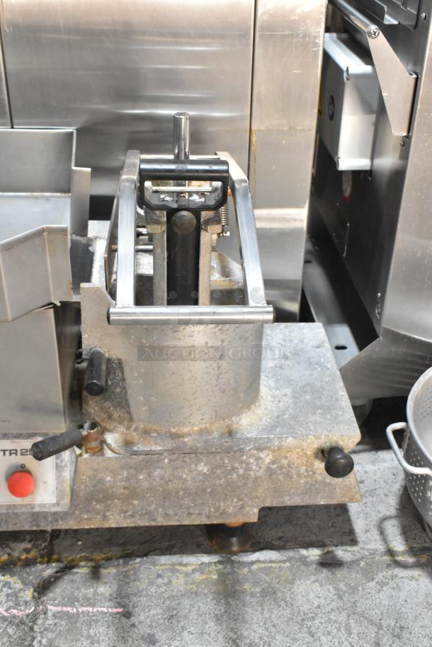 Dito Sama TR250 metal commercial vegetable cutter, countertop model, 230 volts. Visible controls and sturdy construction. Some wear.