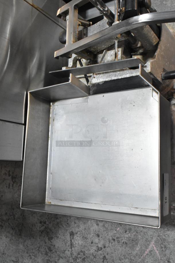 Dito Sama TR250 Commercial Vegetable Cutter, metal construction, 230 volts, countertop model in used condition.