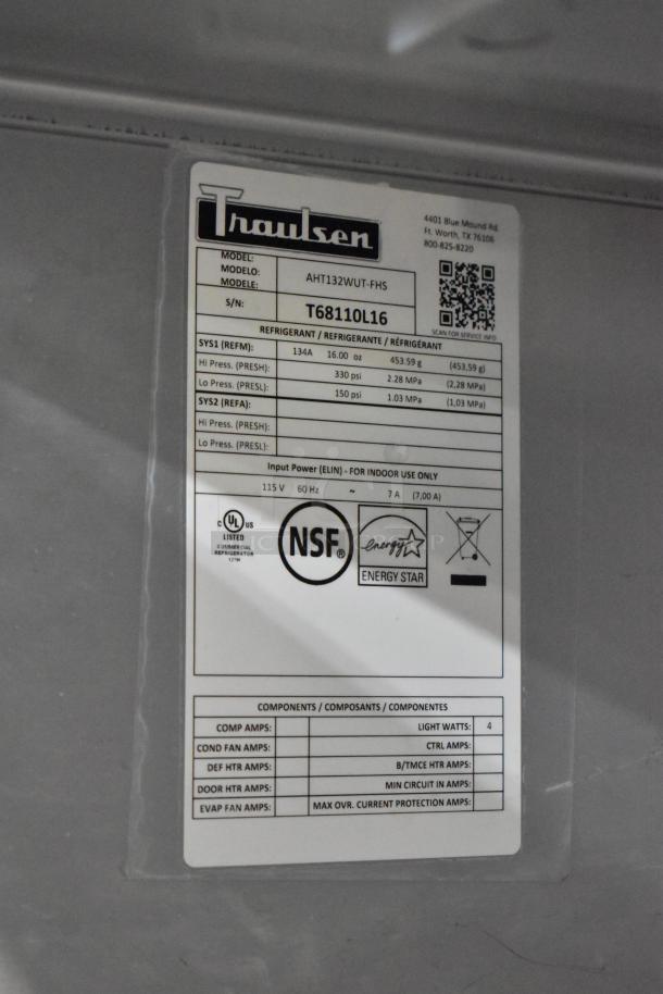 2016 Traulsen AHT132WUT-FHS stainless steel commercial cooler with racks. Single door, on casters, NSF, Energy Star certified.