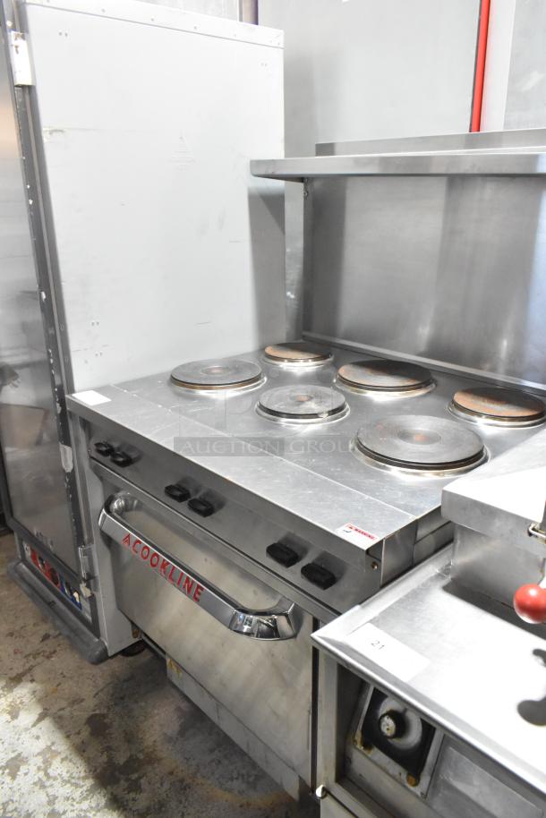 Cookline stainless steel 6-burner hot plate range with oven, over shelf, and back splash; commercial-grade condition.