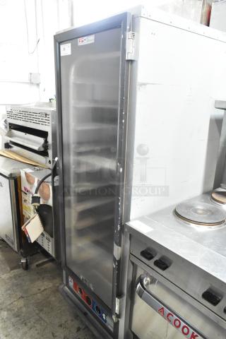 Metro C519-CFC-4 heated holding cabinet on casters, metal exterior, visible control panel, 120V, 1 phase, good condition.