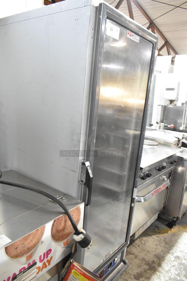 Metro C519-CFC-4 metal heated holding cabinet on commercial casters, clean condition, 120V, 1-phase; visible control panel.