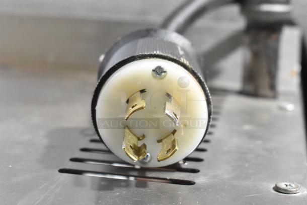 Bunn IMIX-5 commercial cappuccino machine, stainless steel, 120/208-240V, single-phase plug, close-up of power connector.
