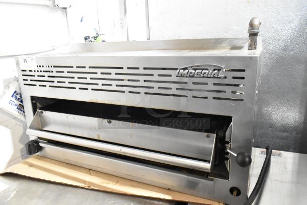 Imperial stainless steel commercial gas cheese melter, used condition, visible branding, suitable for professional kitchens.