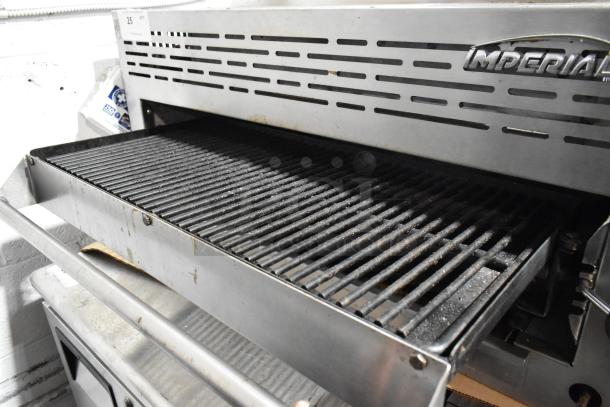Imperial Stainless Steel Commercial Gas Cheese Melter, used condition, features grilling surface, vents, and branded label.