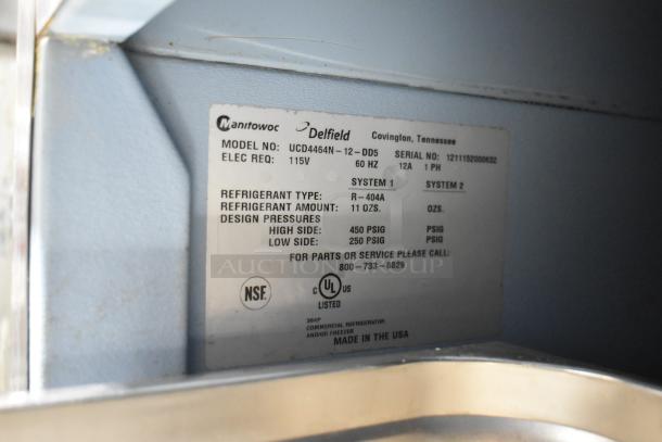 Delfield UCD4464N-12-DD5 commercial prep table label, 115V, R-404A refrigerant, NSF certified, made in the USA.