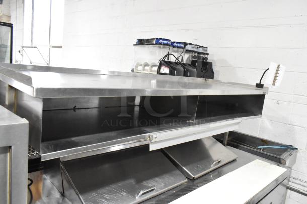 Delfield UCD4464N-12-DD5 stainless steel prep table, 4 drawers, over shelf. Excellent condition, 115V, 1 Phase.