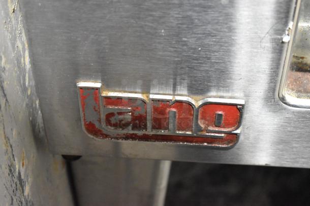 Lang EHS-8 stainless steel commercial half-size convection oven with view-through doors, metal racks, and Lang logo.
