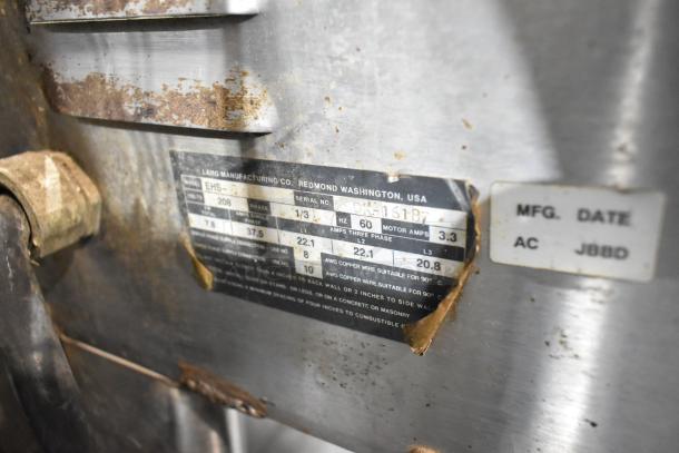 Lang EHS-8 stainless steel convection oven label indicating 208 volts, 1/3 phase, model and serial number, in used condition.