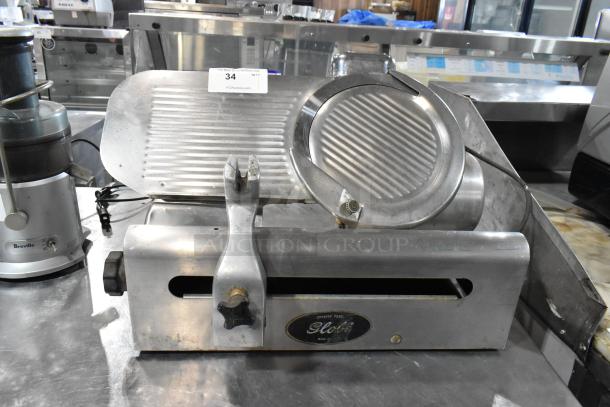 Globe 500 stainless steel meat slicer, commercial countertop model, 115 volts, 1 phase, visible wear, label intact.
