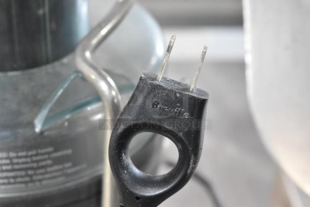 Breville countertop juicer with visible plug and markings, 115 volts, 1 phase, in good condition.