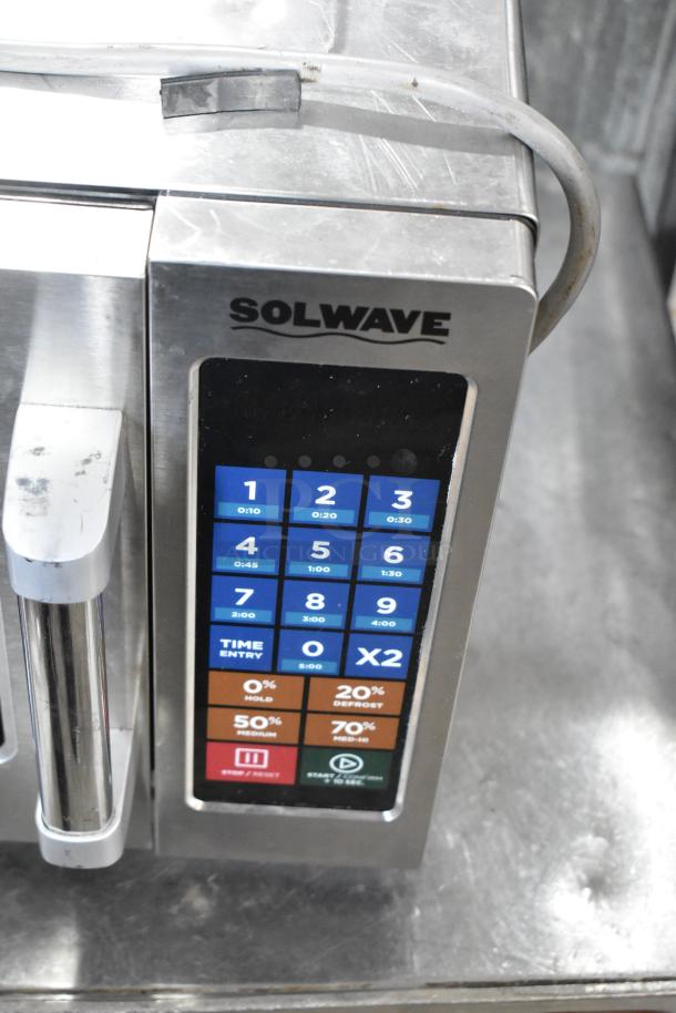 2022 Solwave 180MW112T stainless steel commercial countertop microwave oven, 120V, digital controls, excellent condition.