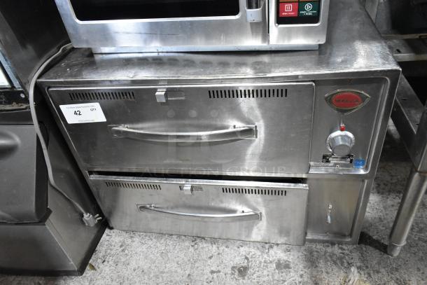 Wells RW2HD stainless steel 2-drawer warming drawer, 120 volts, 1 phase; visible controls and branding, good condition.