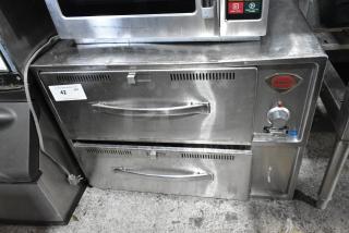 Wells RW2HD stainless steel 2-drawer warming drawer, 120 volts, 1 phase; visible controls and branding, good condition.
