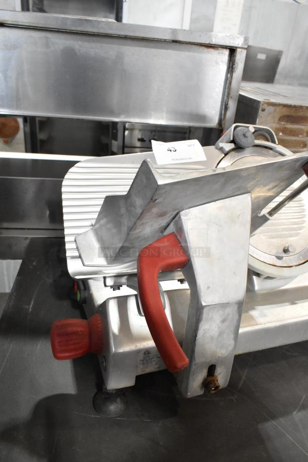 Berkel 825A-PLUS metal commercial meat slicer with blade sharpener, red handles, 115 volts, 1 phase, countertop model.
