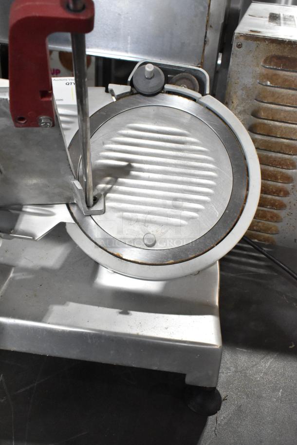 Berkel 825A-PLUS metal commercial meat slicer with blade sharpener, used, 115V, 1 Phase, visible wear.