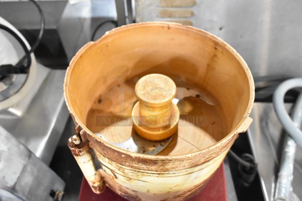 Robot Coupe R2 metal countertop food processor with bowl, lid, two grating blades, slicing blade. Visible wear, 120V, 1 phase.