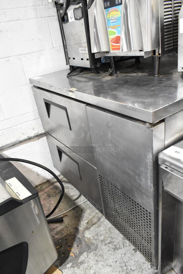 True stainless steel commercial 2-drawer undercounter cooler on casters, 115 volts, 1 phase, in good condition.
