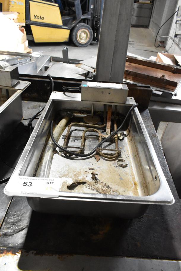 Continental F412502 metal evaporator tray, 120V, 1 phase. Shows signs of use. Bid includes two trays.