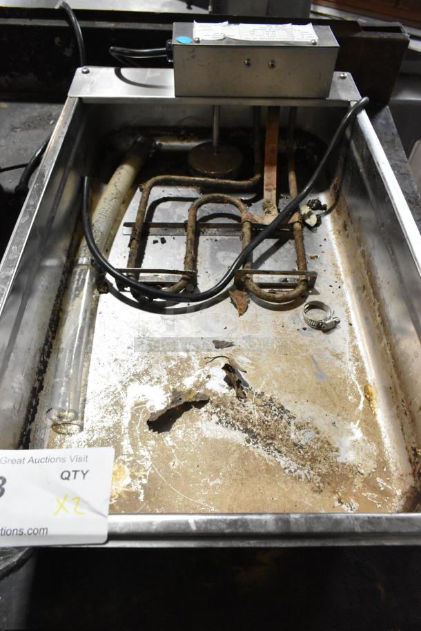 Continental F412502 metal evaporator tray, 120V, 1 phase, well-used condition, visible wiring and components, auction tag.