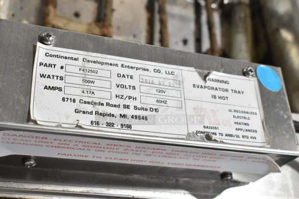 Continental F412502 metal evaporator tray, 120V, 1 phase, 500W, good condition, labeled warning: "Evaporator tray is hot."